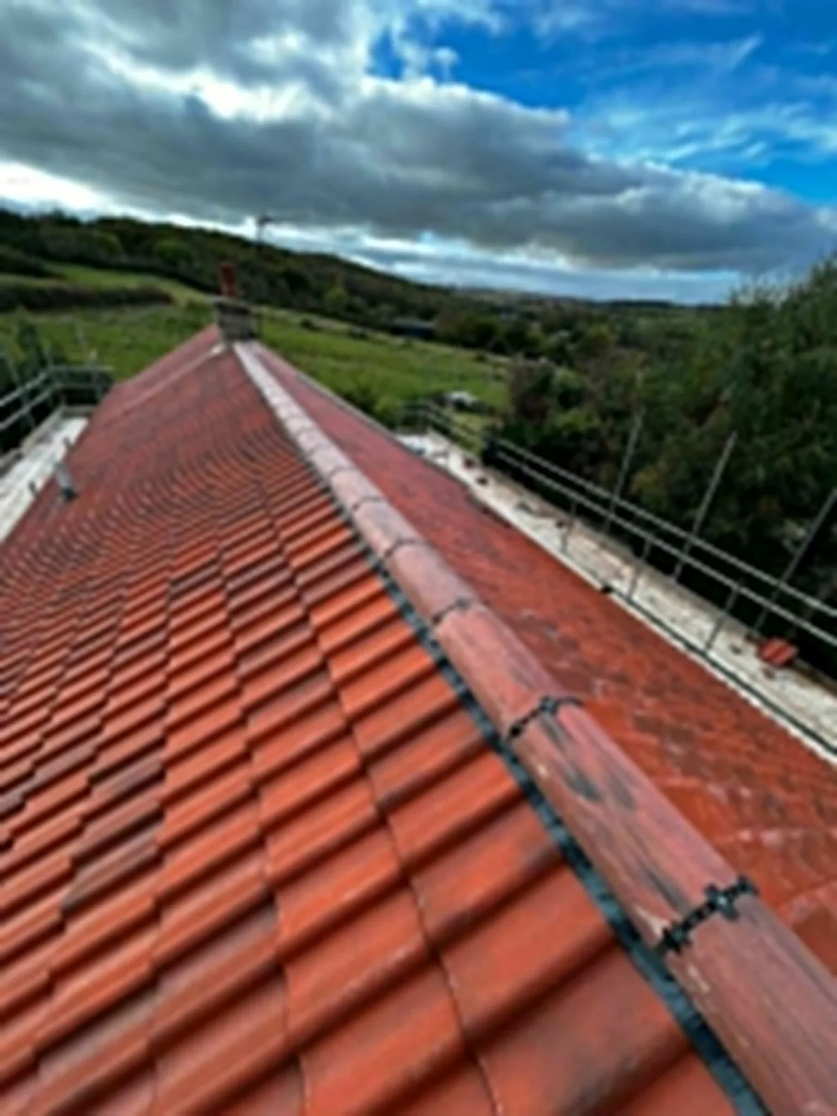Red tiled roof with a long ridge line
