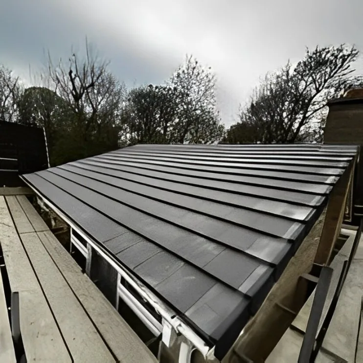 Solid tiled roof fitted over a glazed extension