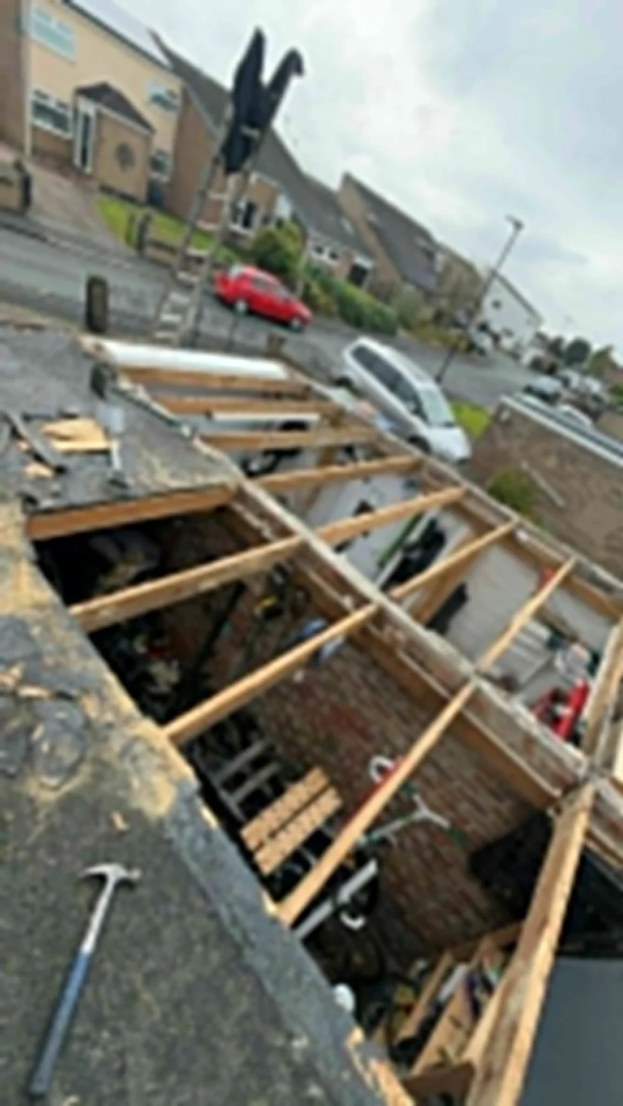 Roof stripped back to exposed timber rafters