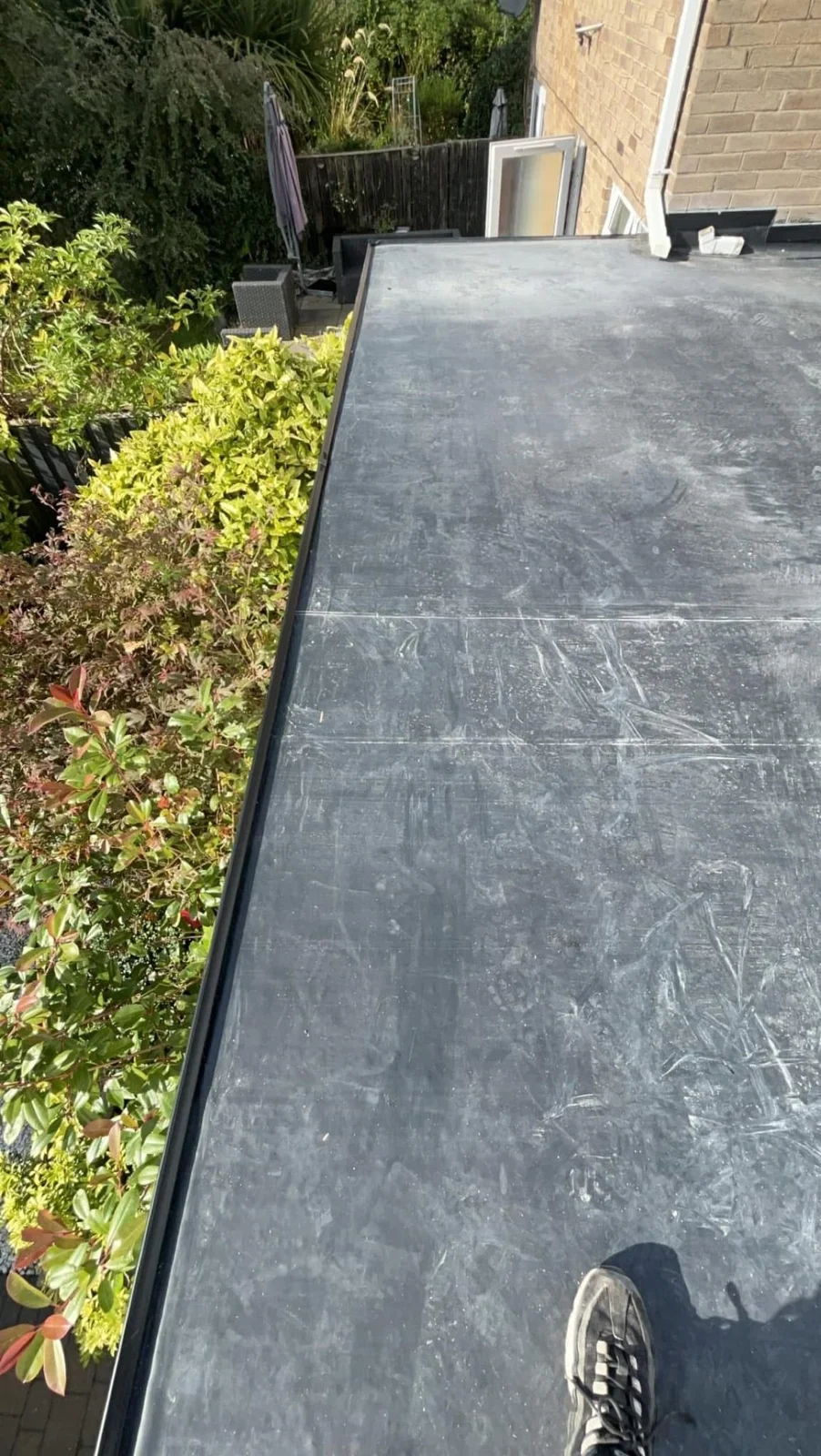 Finished EPDM rubber flat roof with edge trim